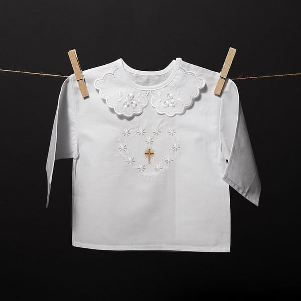 Embroidered christening gown with a pattern