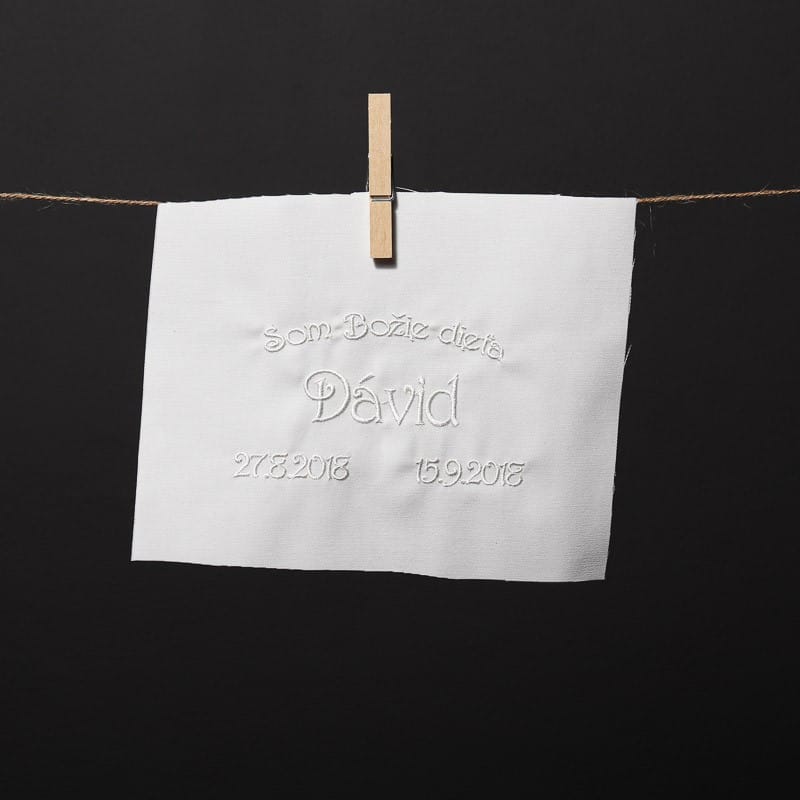 embroidered name, date of baptism, date of birth, and the text "I am a child of God"