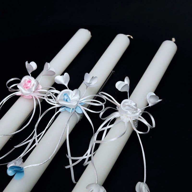 Plain baptism candle with a satin decoration